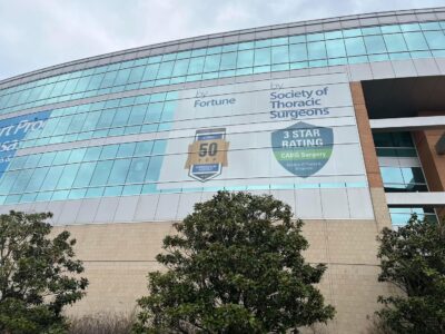 รับพิมพ์สติ๊กเกอร์ซีทรูติดอาคารสูง