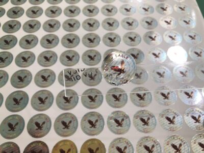 พิมพ์สติ๊กเกอร์กันปลอม